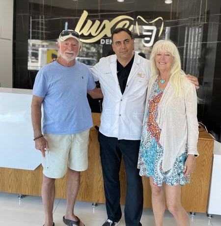 Dr. Jimenez with a patient couple
