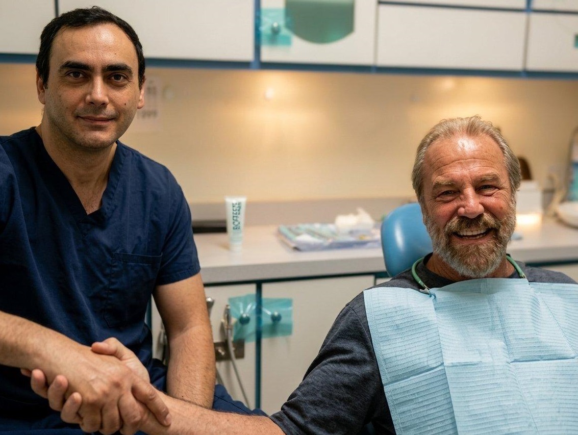 Dental specialist consulting with an implant patient