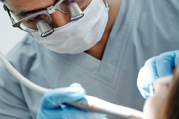 Patient receiving dental treatment at Jimenez Dental Group